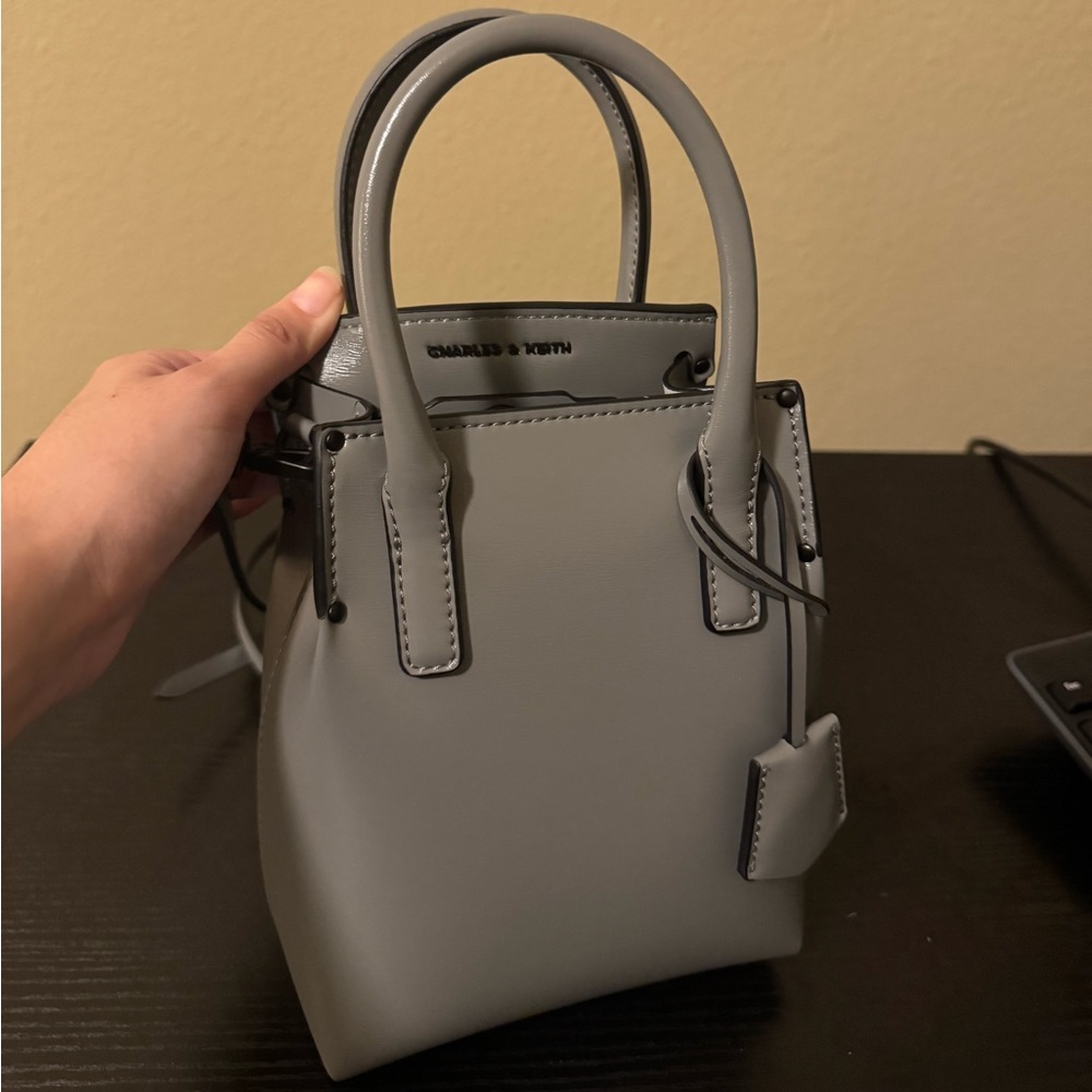 Charles & Keith Elegant Rene Elongated Top Handle Bag in Grey